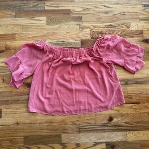 Express off the shoulder blouse, size large in a pinkish color.